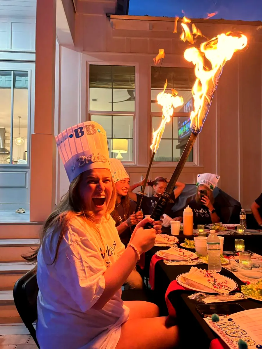 Hibachi fire show performance at backyard party in NW Florida